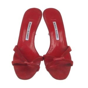 Manolo Blahnik Suede Slides
Red
Leather Trim
Stiletto Heels